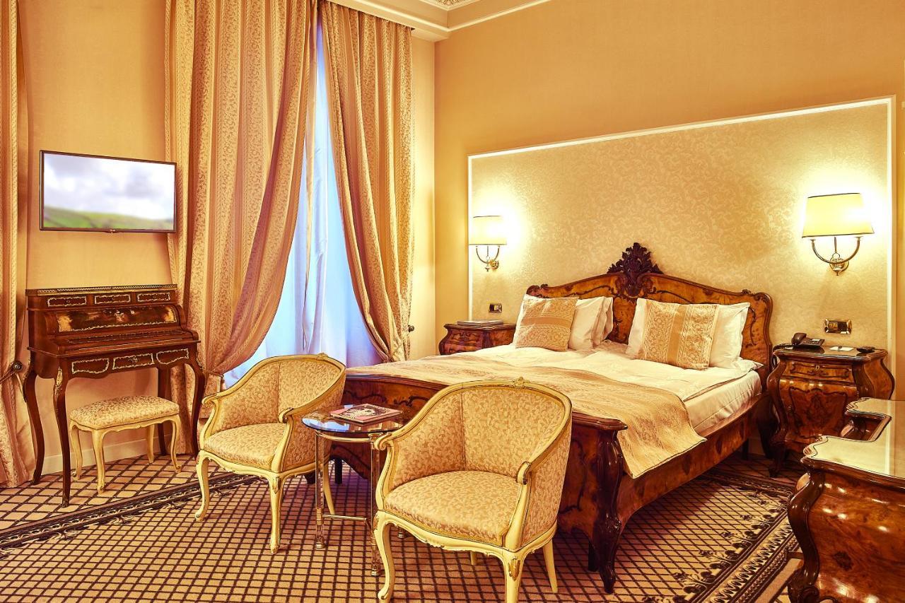 Grand Hotel Continental Bucuresti Luaran gambar A room at the hotel