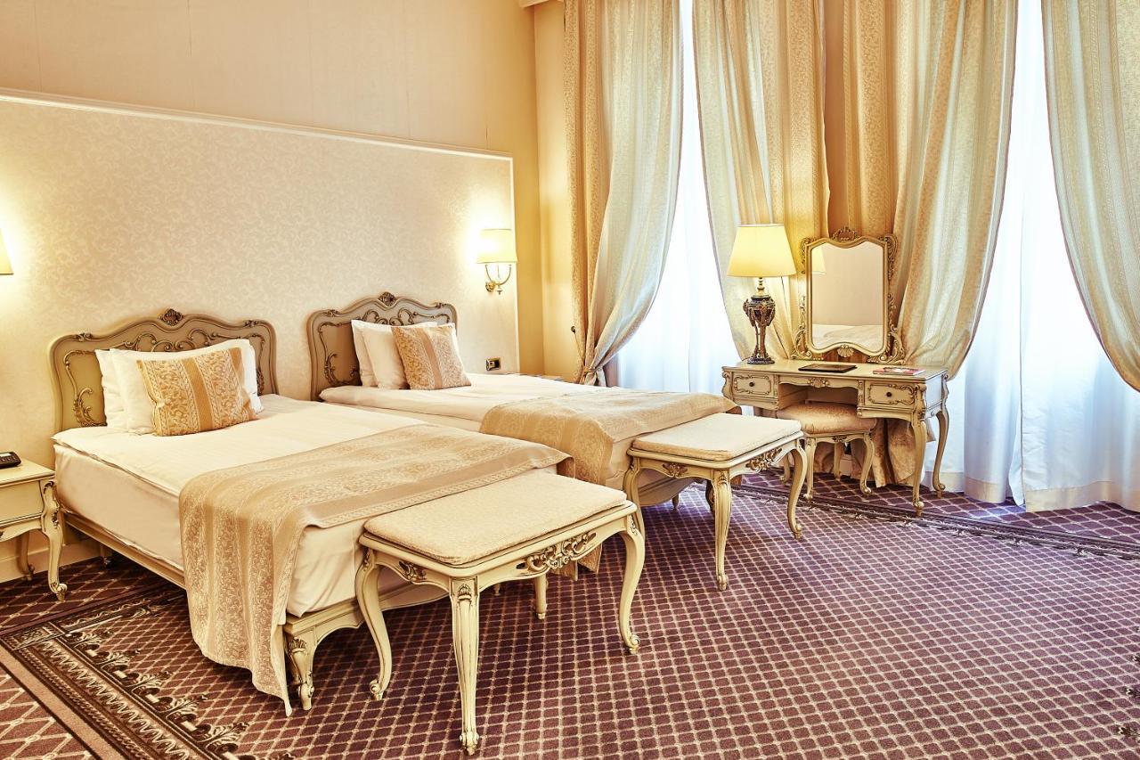 Grand Hotel Continental Bucuresti Luaran gambar A room at the hotel