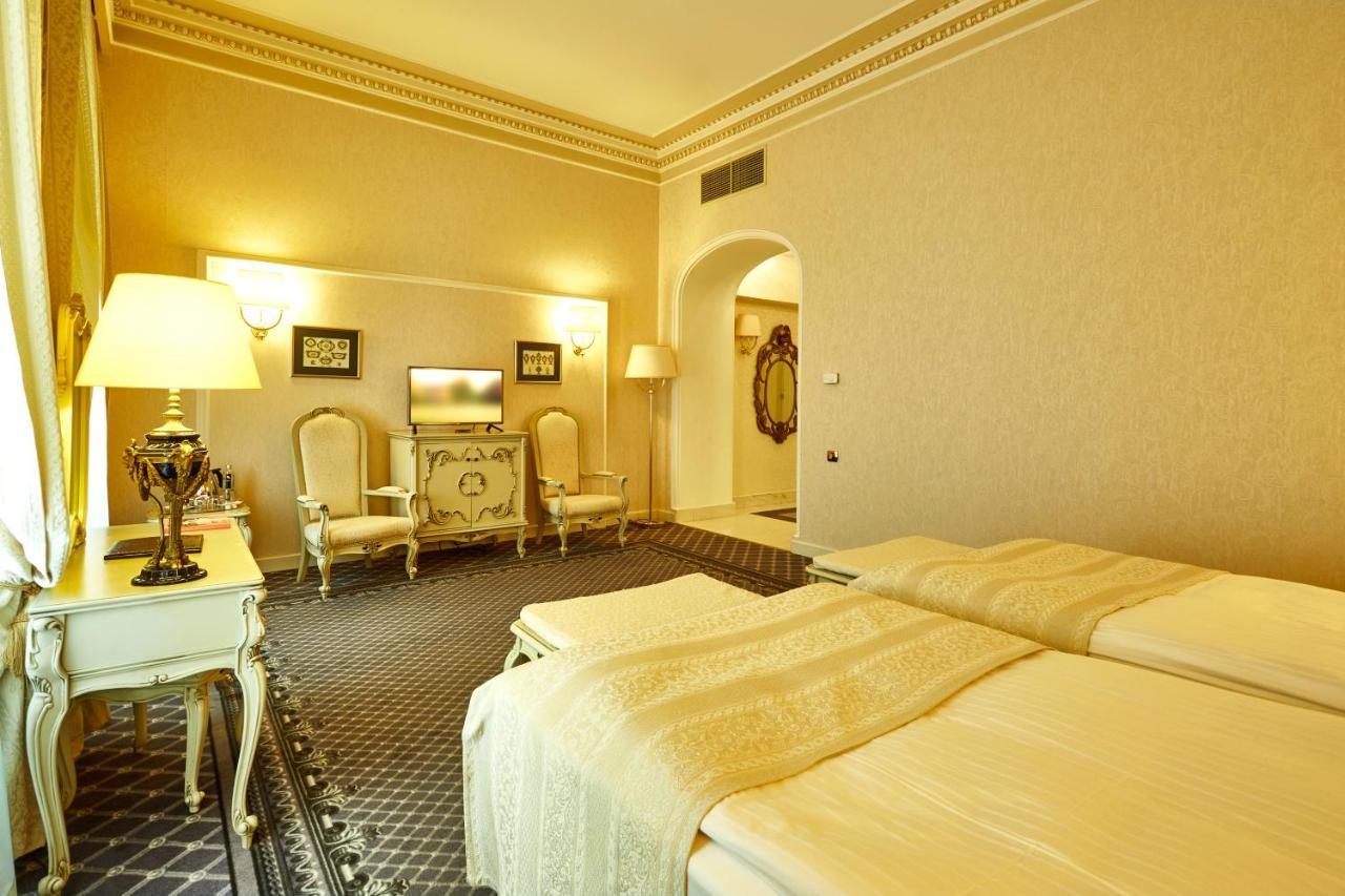 Grand Hotel Continental Bucuresti Luaran gambar A room at the hotel