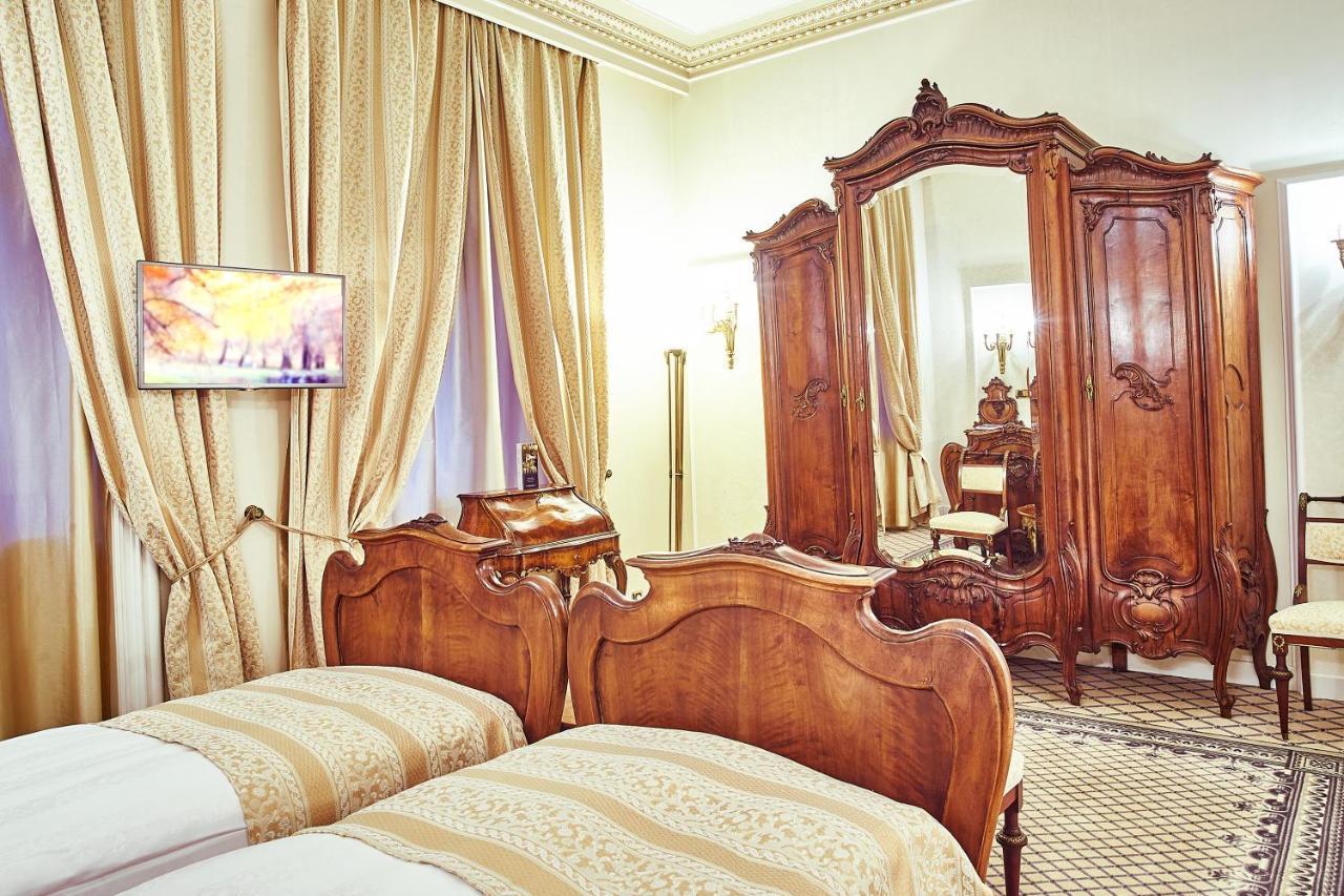 Grand Hotel Continental Bucuresti Luaran gambar A room at the hotel