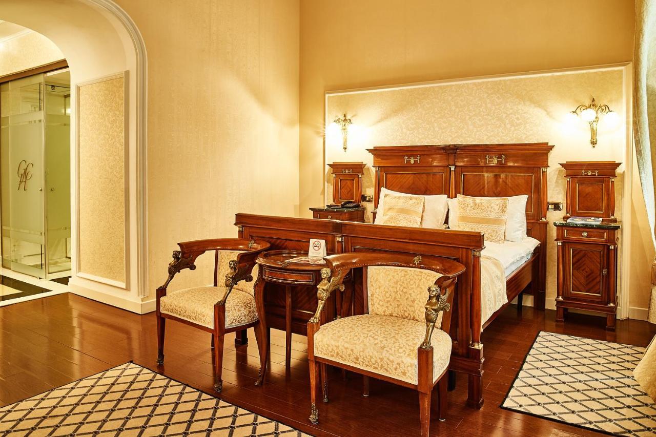 Grand Hotel Continental Bucuresti Luaran gambar A bedroom at the hotel